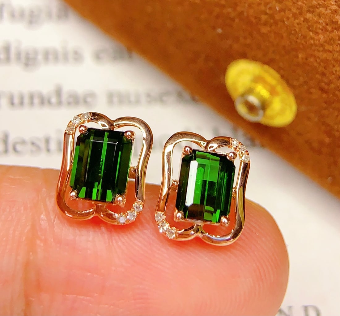18K Gold Natural Tourmaline Earrings: Title: 18K Gold Natural Tourmaline Earrings Description: These earrings are meticulously crafted in 18K gold, showcasing the unique charm of natural tourmaline. The main stone is full of color,