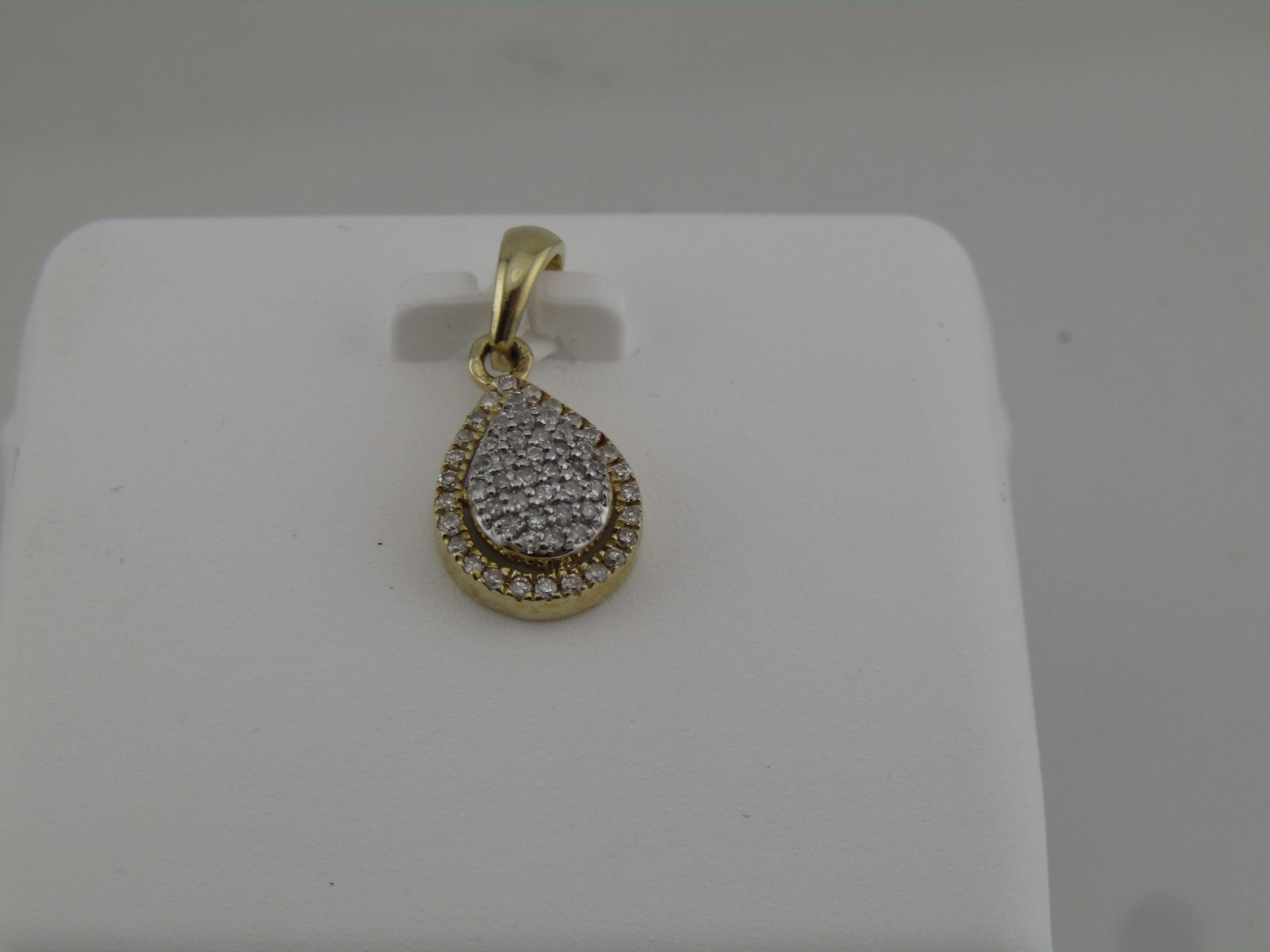 10kt Natural Diamond Pear Shaped Pendant, 1/8 CTW (1 of 4)