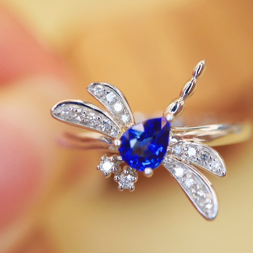 14K GOLD 0.49 CTW VIVID BLUE NATURAL SAPPHIRE and DIAMOND RING: Title:14K GOLD 0.49 CTW VIVID BLUE NATURAL SAPPHIRE and DIAMOND RING Description:Ref:230678153Gold Content:14K GoldRing Size:7.25USMain Gemstone:SapphireNumber of stones:1Shape:PearCarat