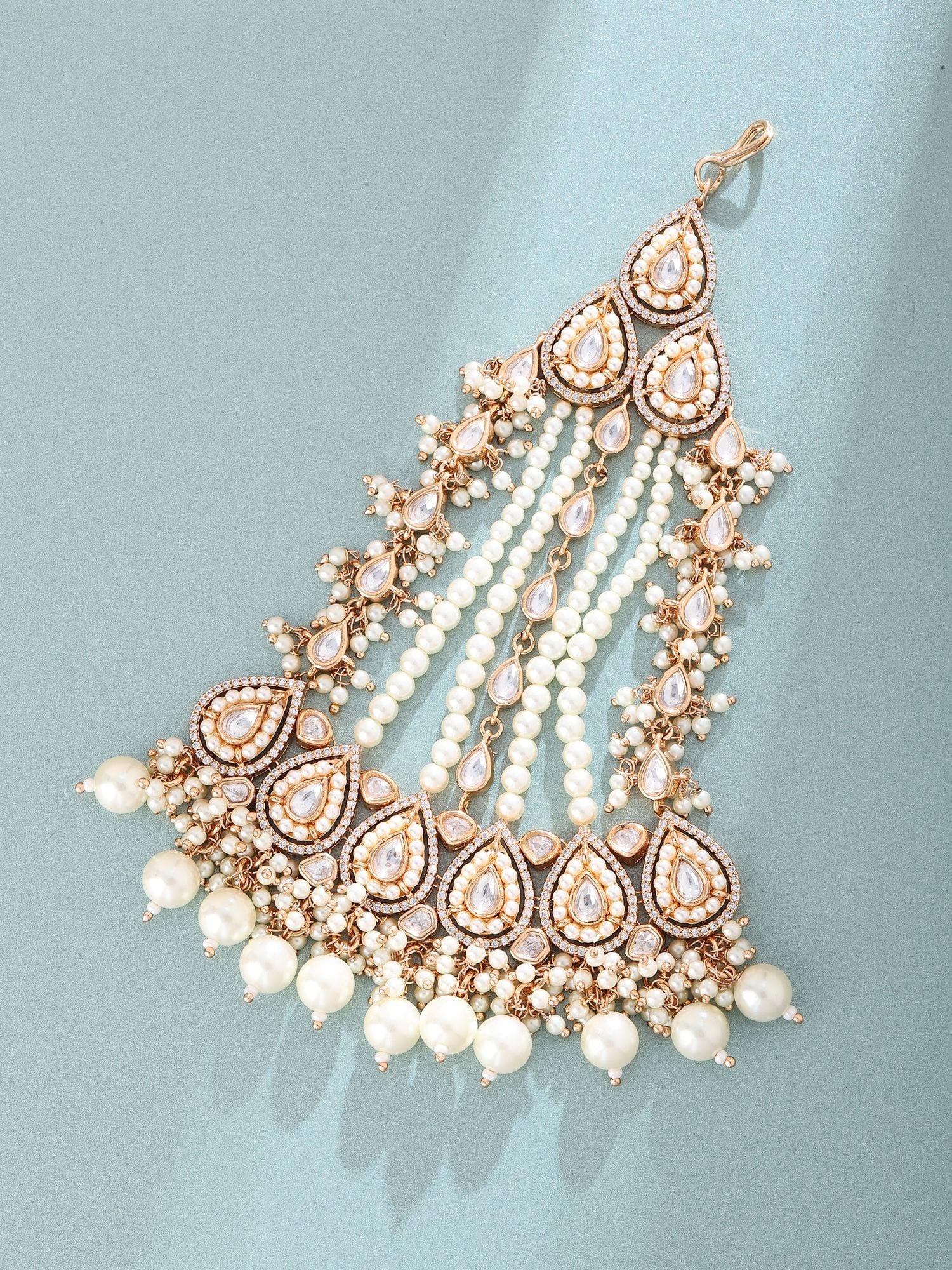 Multi-Strand Pearl Drop Kundan Stone Studded Bridal Passa (Side Tikka): Title:Multi-Strand Pearl Drop Kundan Stone Studded Bridal Passa (Side Tikka) Reference:itemcode : JA0724 Reserve: $86.00 Shipping: Domestic: Shipping rates are determined by destination