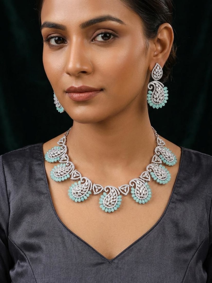 Sea Green Paisley Design American Diamond Necklace Set with Earrings: Title:Sea Green Paisley Design American Diamond Necklace Set with Earrings Reference:itemcode : JA0688 Reserve: $140.00 Shipping: Domestic: Shipping rates are determined by destination International:
