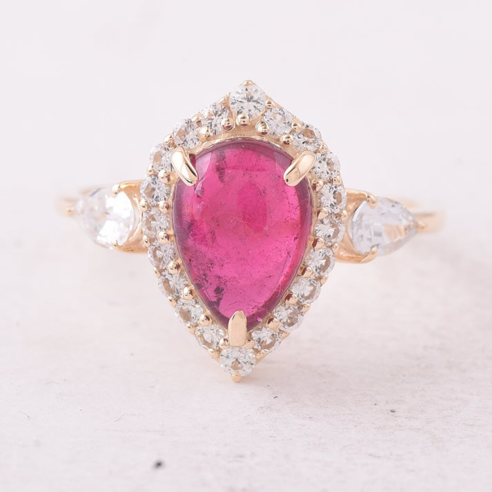 3.05 Ct Pear Tourmaline 9K Gold Ring: 3.05 Total Carat Tourmaline 9K Gold Ring Specifications: Total Weight 2.196 g Center Gemstone Tourmaline Gemstone Carat Weight 2.25 Carats Gemstone Measurements 9.70X7X4.30 mm Additional Gemstones