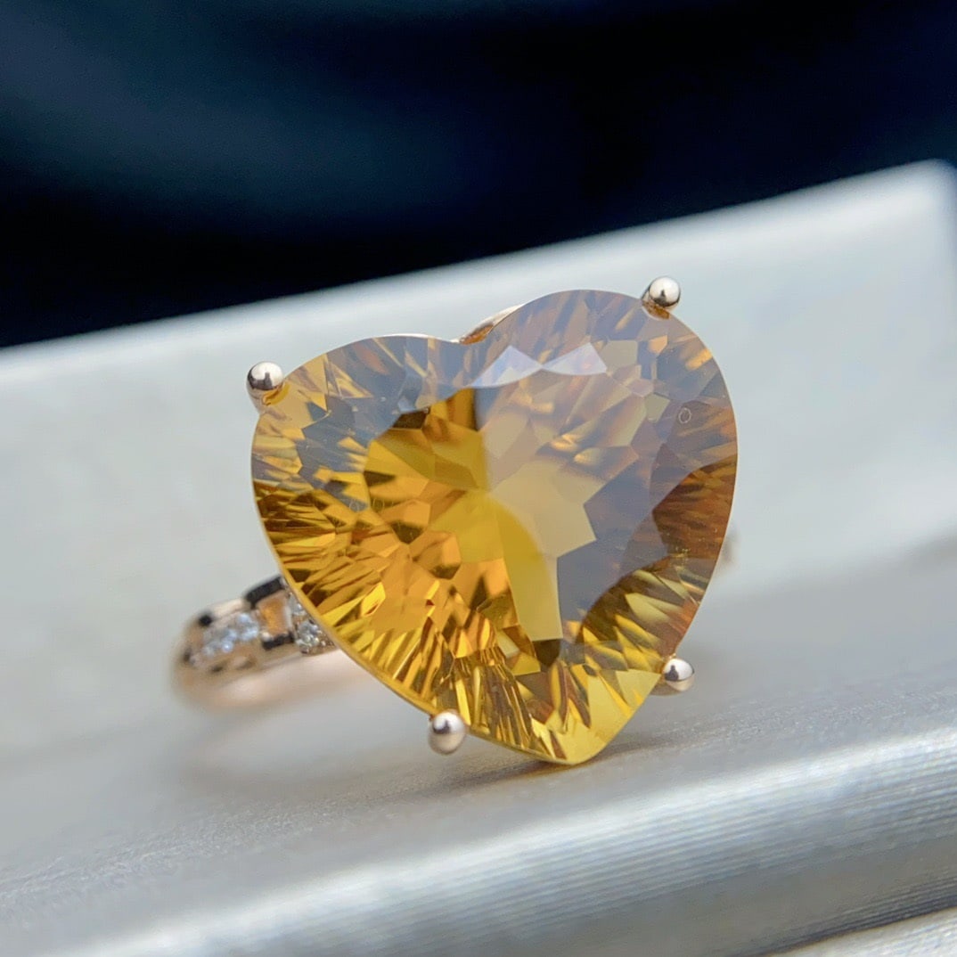 14K GOLD 7.02 CT NATURAL CITRINE and DIAMOND RING: Title:14K GOLD 7.02 CT NATURAL CITRINE and DIAMOND RING Description:Ref:230678126Gold Content:14K GoldRing Size:7.25USMain Gemstone:CitrineNumber of stones:1Shape:HeartCarat Weight:7.02ct