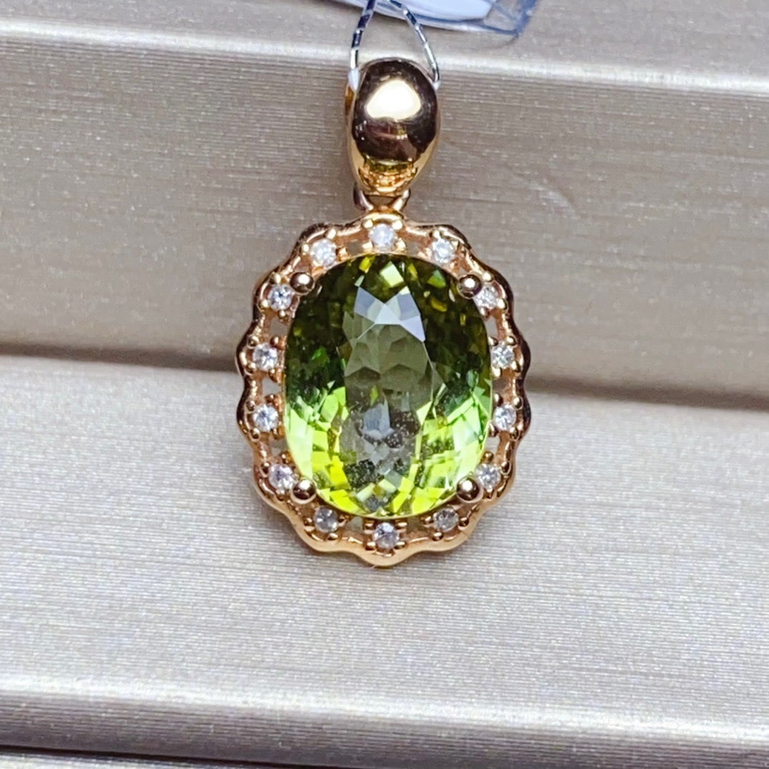 14K GOLD 3.2 CT NATURAL TOURMALINE and DIAMOND PENDANT: Title:14K GOLD 3.2 CT NATURAL TOURMALINE and DIAMOND PENDANT Description:Ref:230678147Gold Content:14K GoldMain Gemstone:TourmalineNumber of stones:1Shape:OvalCarat Weight:3.2ct Color:GreenTreatment:N