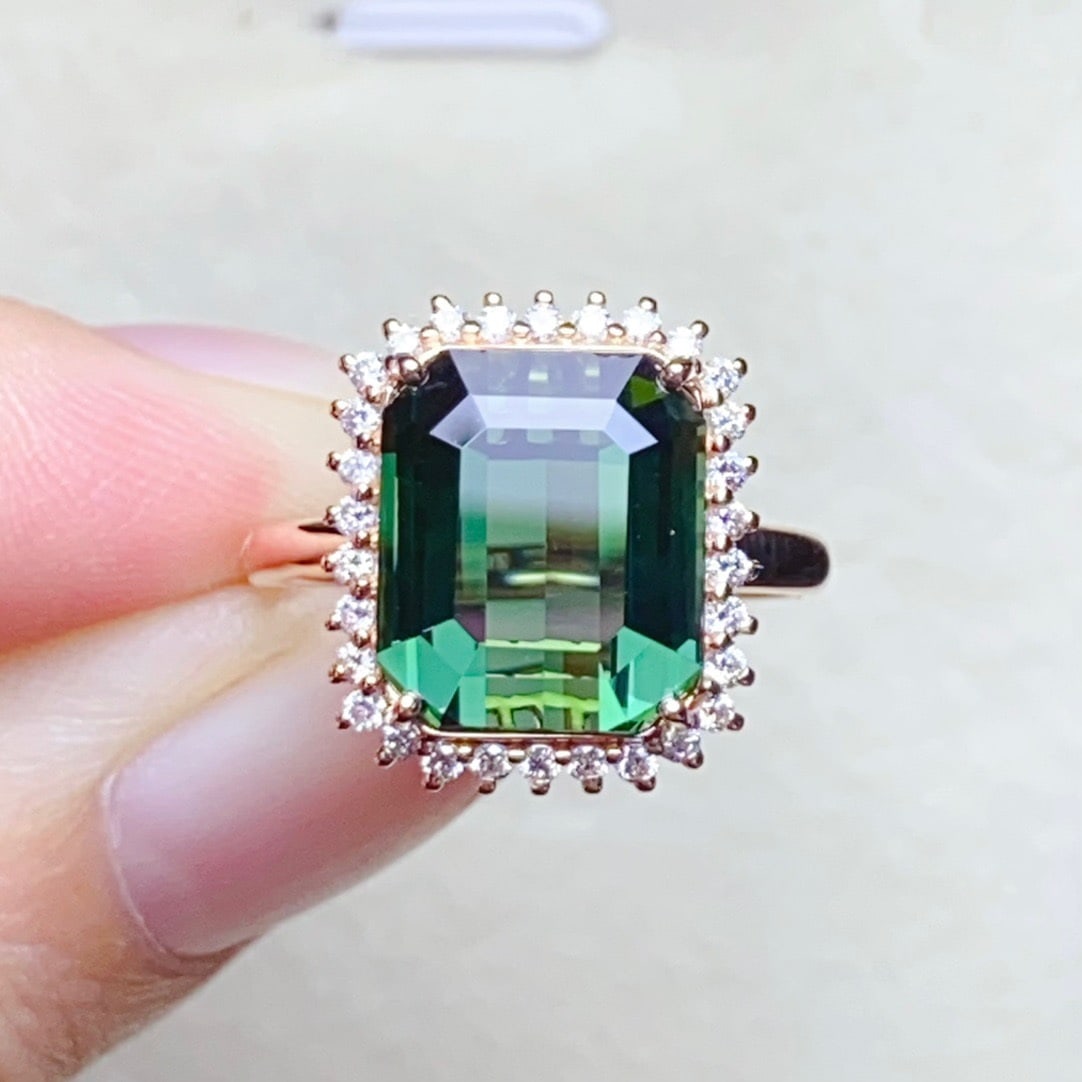 14K GOLD 5.05 CT NATURAL TOURMALINE and DIAMOND RING: Title:14K GOLD 5.05 CT NATURAL TOURMALINE and DIAMOND RING Description:Ref:230678143Gold Content:14K GoldRing Size:7.25USMain Gemstone:TourmalineNumber of stones:1Shape:OctagonalCarat Weight:5.05ct Co