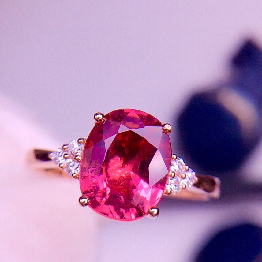 14K GOLD 2.1 CT NATURAL TOURMALINE and DIAMOND RING: Title:14K GOLD 2.1 CT NATURAL TOURMALINE and DIAMOND RING Description:Ref:230678159Gold Content:14K GoldRing Size:7.25USMain Gemstone:TourmalineNumber of stones:1Shape:OvalCarat Weight:2.1ct Color:Red