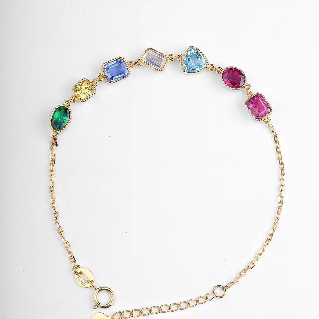 14K GOLD 2.89 CT NATURAL SAPPHIRE and AQUAMARINE and TOURMALINE and SPINEL and TSAVORITE: Title:14K GOLD 2.89 CT NATURAL SAPPHIRE and AQUAMARINE and TOURMALINE and SPINEL and TSAVORITE BRACELET Description:Ref:230678131Gold Content:14K GoldMain Gemstone:Sapphire/Aquamarine/Tourmaline/Spine
