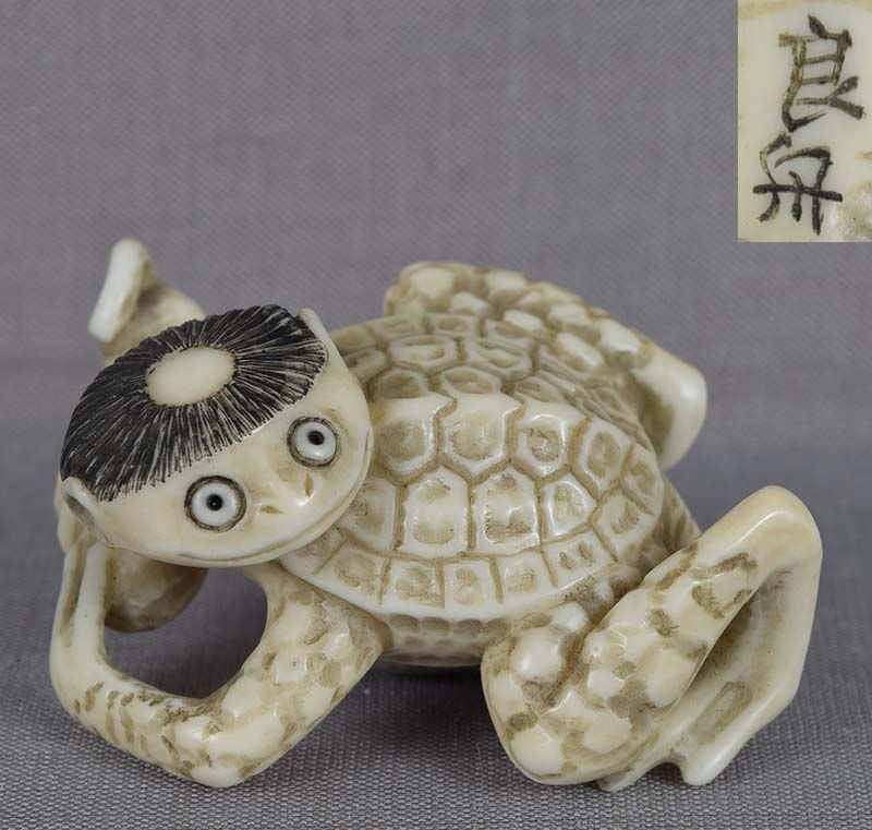 Netsuke KAPPA with cucumber by RYOSHU: Netsuke carved by Ryoshu (born in 1912) - one of the best Japanese netsuke carvers of the 20th century, listed on p. 886 of NETSUKE & INRO ARTISTS AND HOW TO READ THEIR SIGNATURES by George Lazarnick.