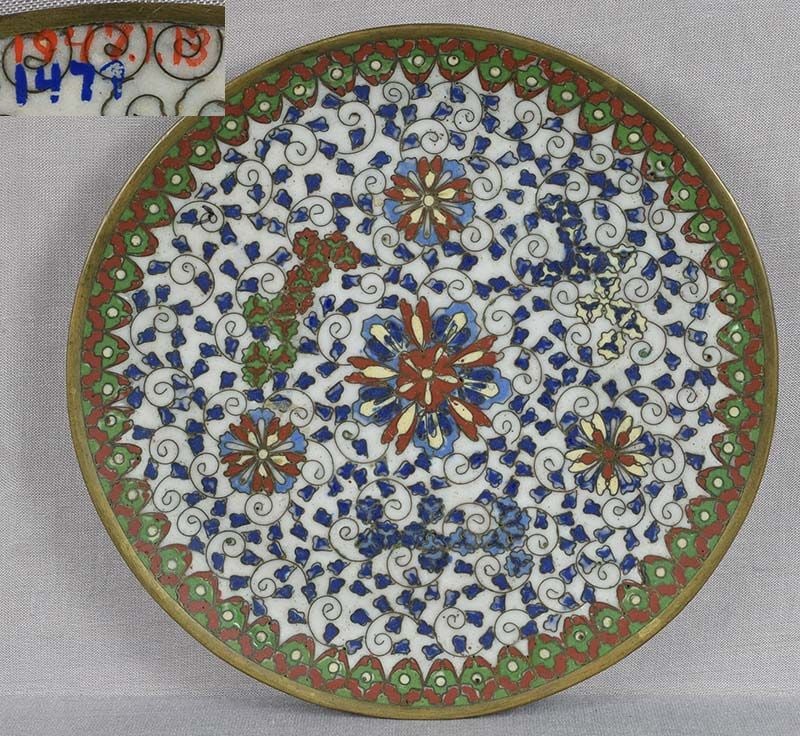 Early 19c Japanese CLOISONNE PLATE ex Rare Art Inc.: Unusual and rare early 19th century Japanese cloisonne plate with complicated design of flowers among scrolling vines. Very strong design, came with Rare Art Inc. provenance, old collection number on