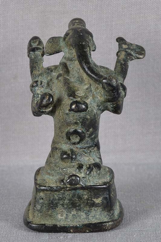 18c Indian bronze GANESHA with rat: 18th century Indian bronze votive sculpture of Ganesha sitting on a square base, his trunk turned to its left, with his vahana (vehicle) - a bandicoot rat - in front of him, and holding his usual