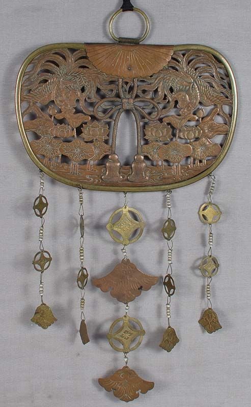 19c Japanese bronze KEMAN Buddhist Temple hanging: 19th century Japanese copper and brass keman in a shape of a rounded fan (uchiwa) with pierced low relief decoration of two phoenixes confronting each other in flight above lotus flowers, buds and