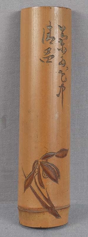 19c Japanese scholar WRIST REST iris and poem: Late Meiji (1890s - 1910s) Japanese bamboo wrist rest used by painters and calligraphers, with low relief carving of an iris flower about to bloom and cursively written poem. Beautiful subtle piece,