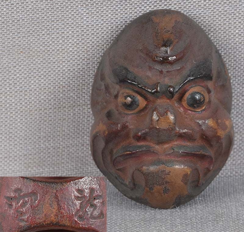 19c netsuke MASK O-BESHIMI by RYUUN: 19th century Japanese small lacquered wood netsuke representing an unusual theatrical mask of O-Beshimi which was used in folk plays by an important figure with “negative” character. Crisp