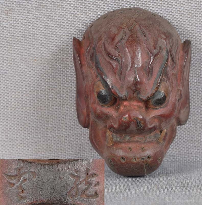 19c netsuke MASK red DEMON by RYUUN: 19th century Japanese small lacquered wood netsuke representing a theatrical mask of red skinned demon with large bat type ears. Uncommon image, excellent intense face, great patina. Crisp detailing, 