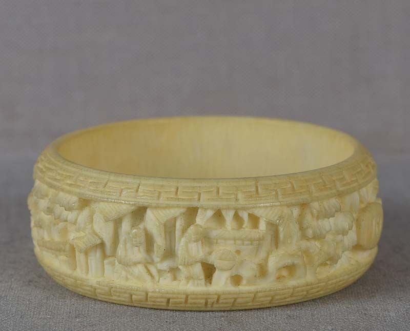 19c Chinese export NAPKIN RING Chinese scholars: 19th century Chinese export napkin ring carved on the outside with a continuous scene of Chinese scholars in different settings. Wonderful work with deep undercutting, beautiful patina, in excellent