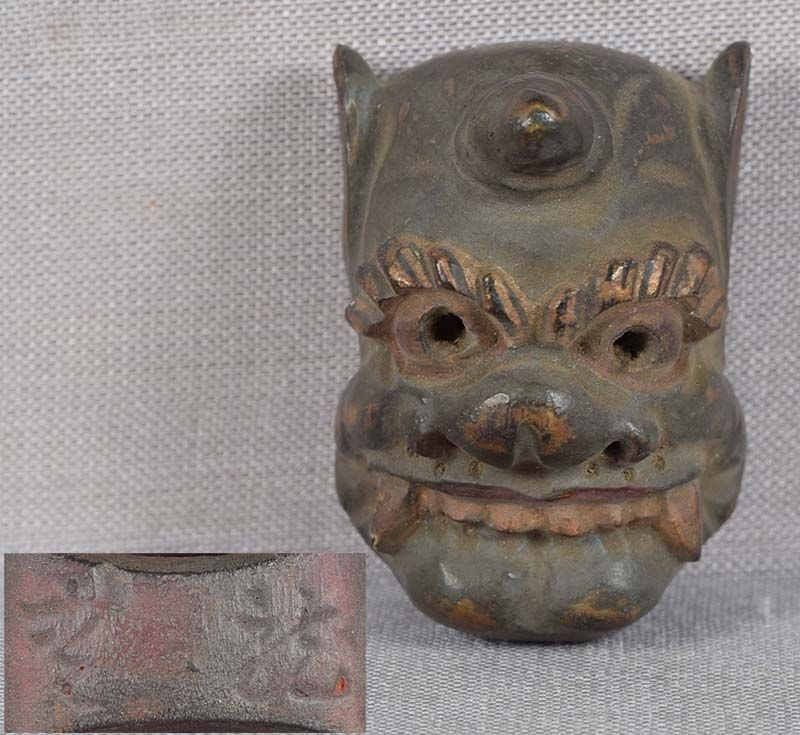 19c netsuke MASK one horned ONI by RYUUN: 19th century Japanese small lacquered wood netsuke representing an unusual theatrical mask of a one-horned oni. Crisp detailing, nicely lacquered, great patina. some wear to the surface. Signed RYUUN
