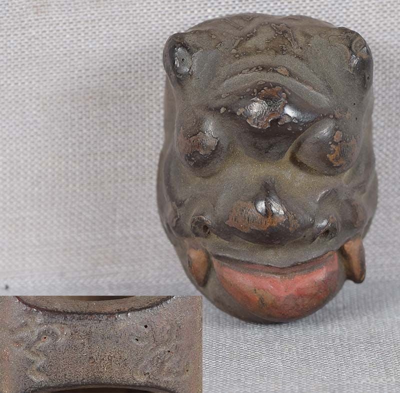 19c netsuke MASK DEMON sticking out tongue by RYUUN: 19th century Japanese small lacquered wood netsuke representing a theatrical mask of a demon sticking out its tongue. Excellent intense face, crisp detailing, nicely lacquered, great patina, some