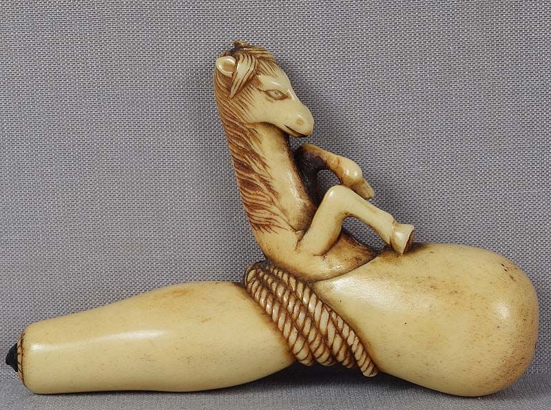 19c staghorn netsuke Chokwaro Sennin HORSE with gourd: Rather unusual decent size 19th century staghorn netsuke of a horse appearing from a dried gourd that has a rope tied around its waist. According to a Japanese legend Chokwaro sennin (Chinese sage)