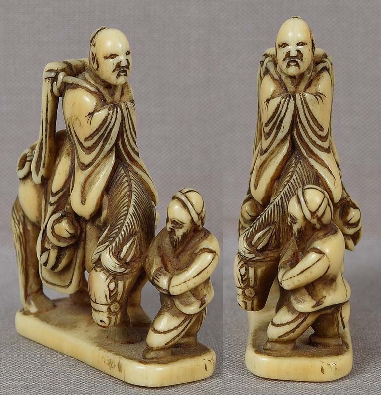 Early 19c netsuke TOBA on mule with attendant - 2
