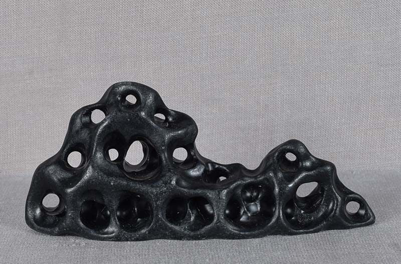 Vintage Chinese scholar BRUSH REST soapstone as Taihu rock: Vintage Chinese soapstone small brush rest carved to represent a Taihu scholar’s rock with numerous perforations and crevices. Beautiful intensely black soapstone with excellent waxy surface,