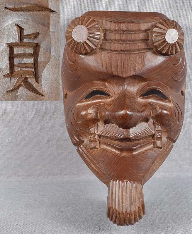 1900s Japanese mask OKINA by netsuke carver ICHISADA: Late Meiji - early Taisho (1900-1920) okimono size wooden mask of the old man Okina with its typical smiling expression. Actual size masks are used in Sambaso dance. Wonderfully captured facial
