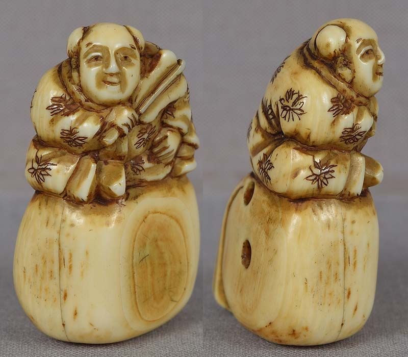18c netsuke BOY on bag - 2