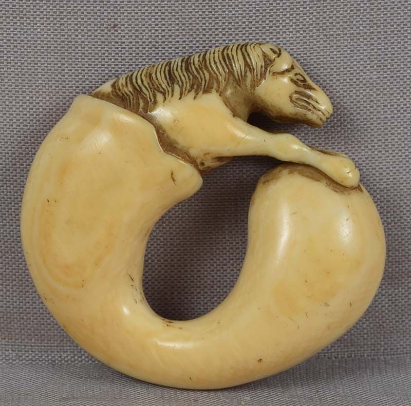 18c netsuke HORSE out of Chokwaro Sennin’s gourd: 18th century netsuke of the magic horse appearing from a dried gourd. According to a Japanese legend the gourd belonged to Chokwaro sennin (Chinese sage) who could summon the magic horse out of it to 