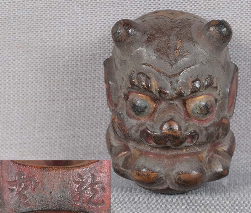 19c netsuke MASK ONI by RYUUN: 19th century Japanese small lacquered wood netsuke representing a theatrical mask of an oni. Crisp detailing, nicely lacquered, great patina. some wear to the surface.. Signed RYUUN on the back bar - 