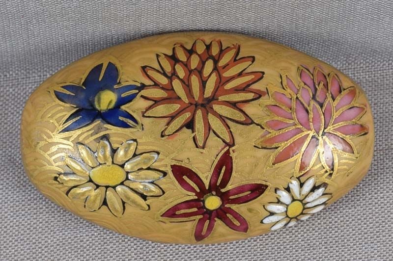1920s Japanese porcelain Kutani OBIDOME netsuke FLOWERS: Late Meiji to early Taisho (1920s) Japanese Kutani porcelain obidome (sash ornament) with enamel decoration of various flowers. Obidome is worn on an obi cord that holds the obi sash together, it is