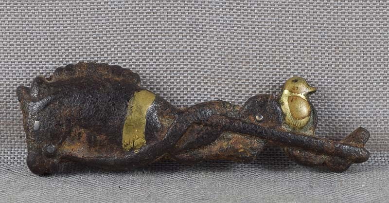 19c Japanese MAE-KANAGU pouch clasp HOBBY HORSE & toy bird: 19th century Japanese iron mae-kanagu (tobacco pouch clasp fitting) depicting two toys - a hobby horse and a bird on wheels. Iron is notoriously difficult to work with. Very nice design, wonderful