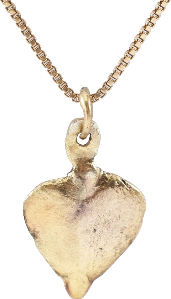 VIKING HEART PENDANT, 9TH-10TH CENTURY AD: Delicate example, just about 3/4" (0.72") total height, of iconic form. Fine full medially ridged rounded section with the back concave. Made by the lost wax process. Surface lightly textured from