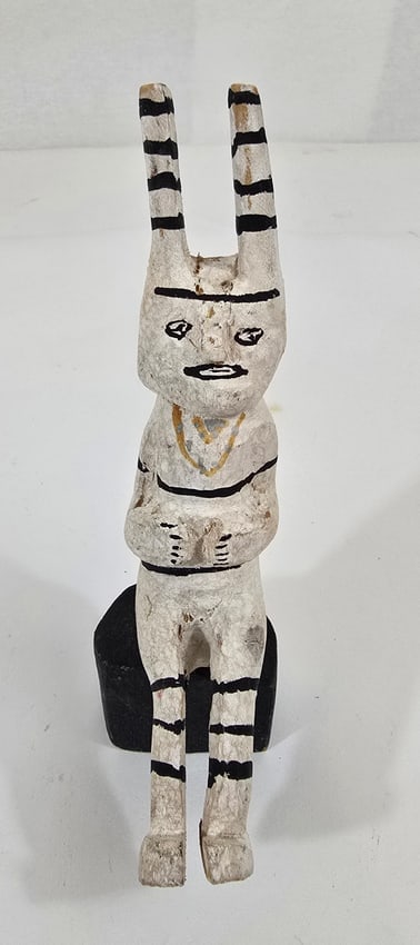 Clown Doll: Title: Clown Doll Dimension: 6.25" tall Description: Appealing seated Koosa clown figure. Possibly by noted carver Jimmy Koots. This carving dates from the 1940s or 1950s and is in excellent