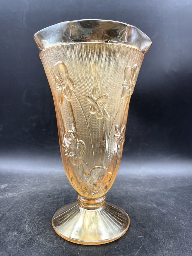 Vintage Jeanette Carnival Glass Vase Iridescent: Date/Period: unknown Dimension: Approx. 9" x 5.5" Material: glass Additional Information: The pattern features embossed irises against a herringbone-textured background. The vase is made of