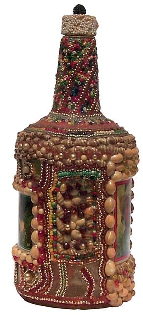 A memory bottle decorated with beads, shells, and trading card: This is a well constructed memory bottle decorated with multicolor beads, shells, and includes two portions of football trading cards and two collecting cards from the TV shows Knight Rider and