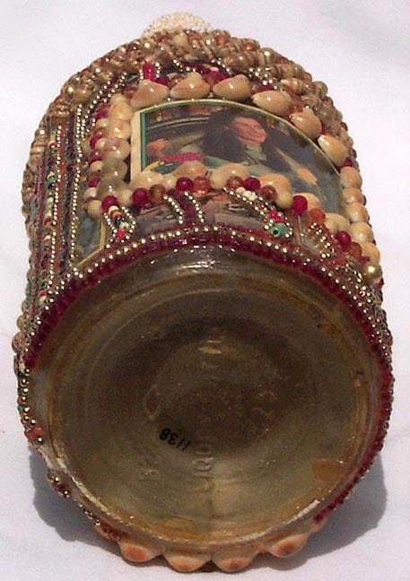 A memory bottle decorated with beads, shells, and trading card - 6
