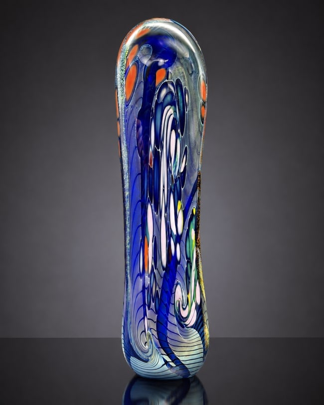 Rollin Karg 1994 Signed Art Glass Sculpture Blue Iridescent 20" Vase: Date/Period: 1994 Dimension: 20" tall x 5" x 4" and 10 pounds 4 ounces in weight Material: glass Additional Information: Striking vintage signed studio art glass sculpture by Rollin Karg, dated 1994.
