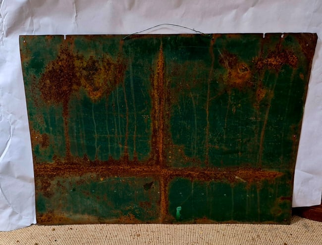 Tin painted sign from Iowa. - 2