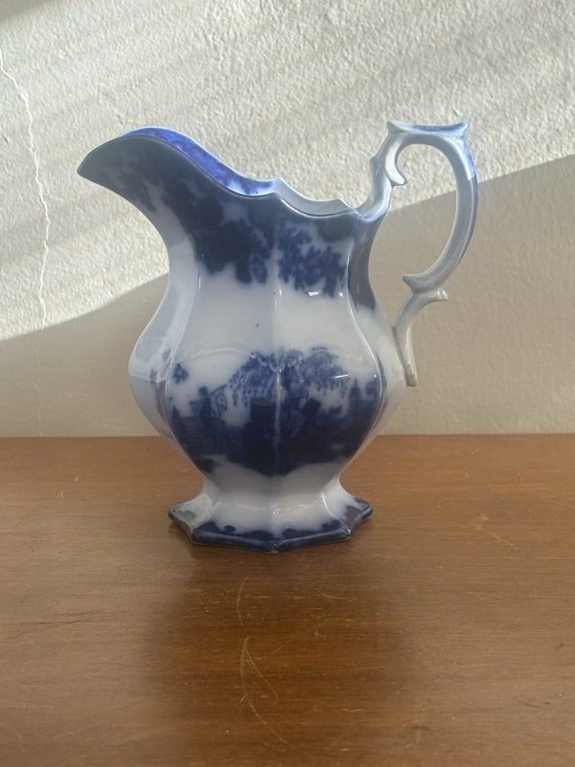 Scinde Flow Blue Creamer: It is 5 7/8" high and is the scinde by alcock pattern that dates around the 1850's. It has a flea bite flake on the top rim. Otherwise it has no other issues Shipping: Domestic: Flat-rate of $15.00 to