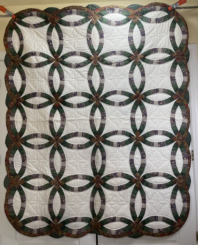 Wedding Ring Quilt 83" x 66": Date/Period: unknown Dimension: Approx. 83" x 66" Material: fabric Additional Information: Wedding Ring Quilt 83" x 66" Shipping: Domestic: Flat-rate of $20.00 to anywhere within the contiguous U.S.