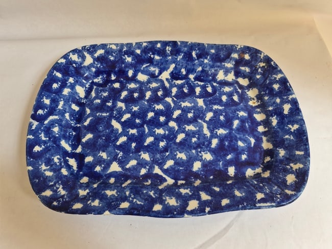 English blue and white spongeware platter: 13 1/2" long and excellent condition. England, mid 19th century. High glaze. Front and back shown. Shipping: Domestic: Shipping rates are determined by destination International: Foreign shipping rate