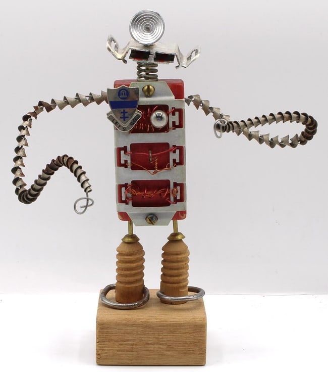 A folk art robot made from found objects: This is a funky, folky robot made from a whimsical assortment of found objects. They are by Pennsylvania folk artist Kent Greenbaum, initialed and sometimes dated. It was made in the 21st c. from