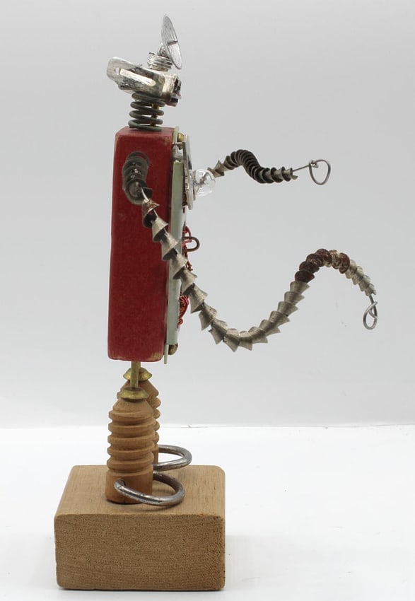 A folk art robot made from found objects - 6