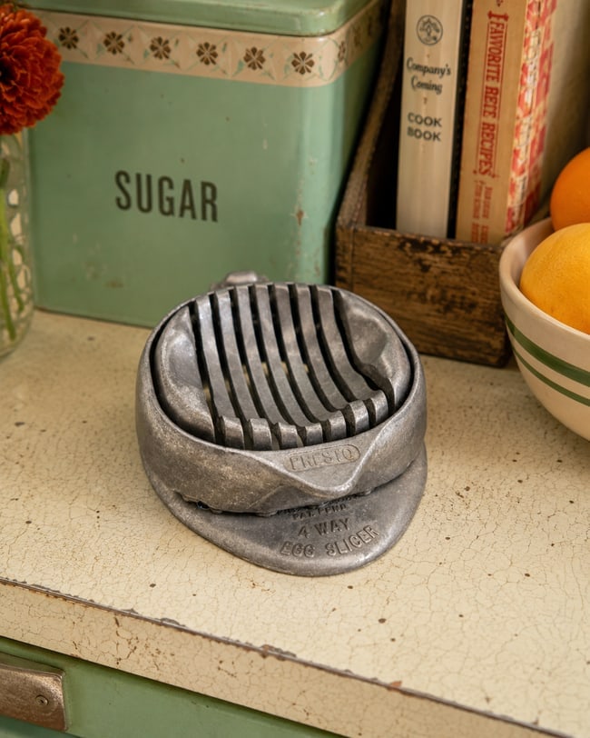 Vintage Presto 4 Way Egg Slicer Aluminum with Metal Wire Cutter 1950s: Date/Period: Approx. 1950's Dimension: Approx. 4.5" Material: metal Additional Information: Vintage Presto 4 Way Egg Slicer Aluminum with Metal Wire Cutter 1950s Shipping: Domestic: Flat-rate of