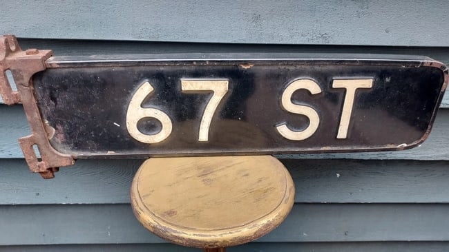 Antique Enamel Street Sign 67th St.: Great look. Not sure if NYC or other city. Definitely 1920's period. Two signs in a frame. Weighs 8 pound and 24" long.. Shipping includes insurance. Shipping: Domestic: Flat-rate of $45.00 to