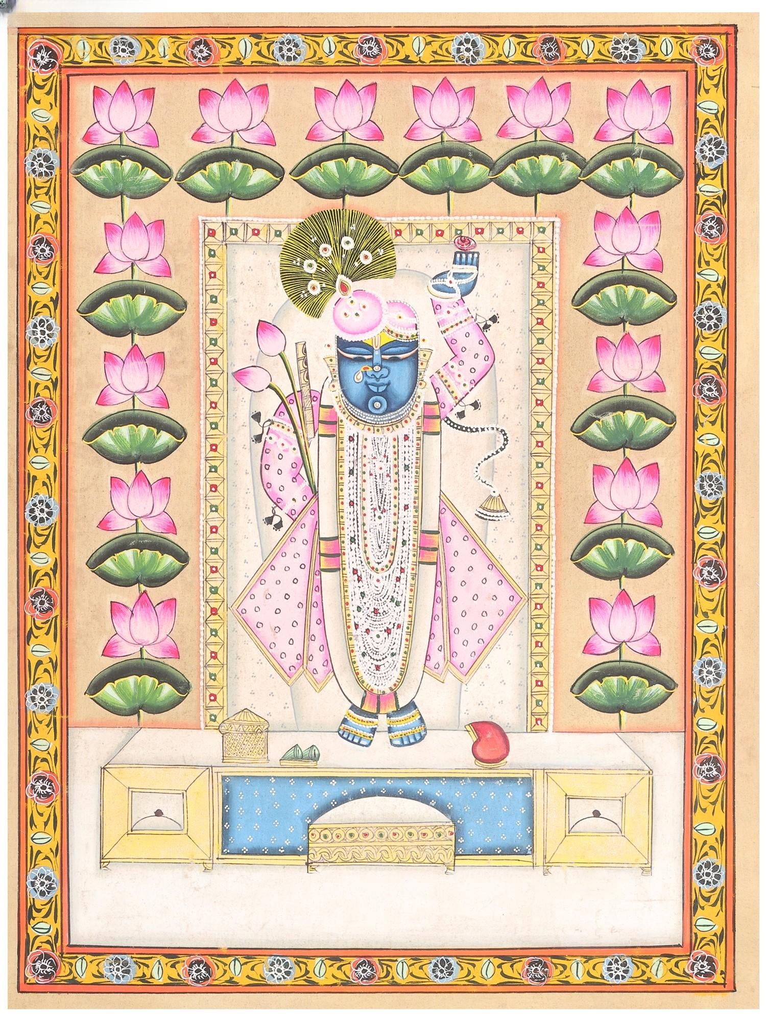 Lotus Adorned Shrinathji | Pichwai Painting: Title: Lotus Adorned Shrinathji | Pichwai Painting Description: Folk Paintings Reserve: $150.00 Shipping: Domestic: Shipping rates are determined by destination International: Foreign