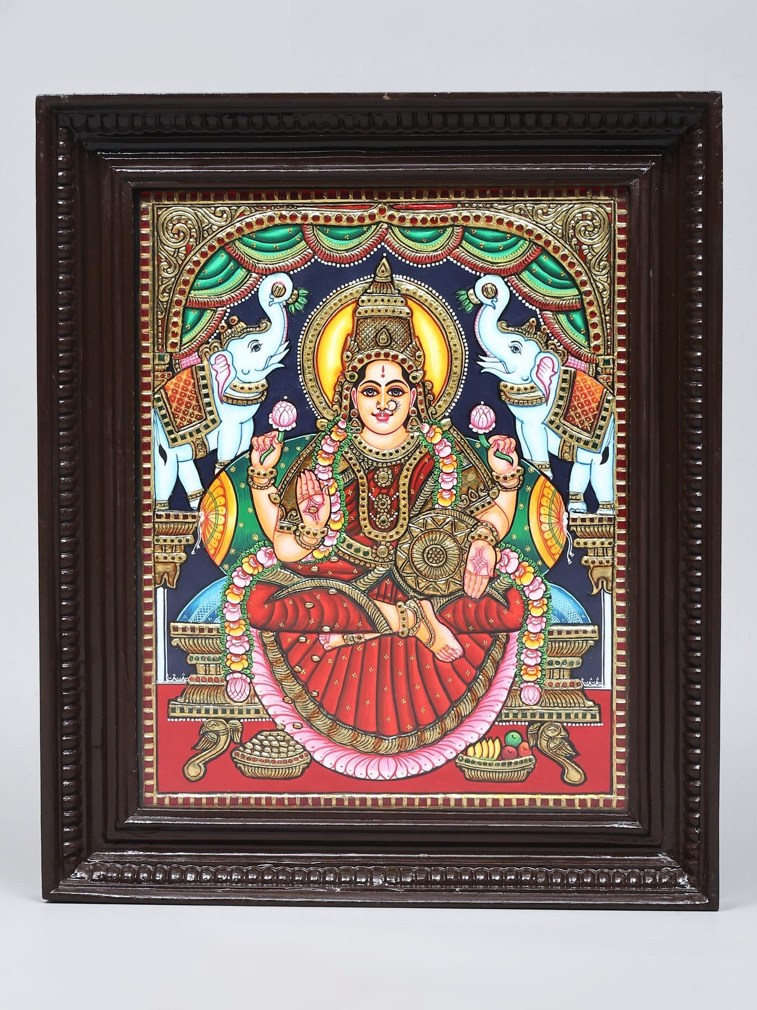Goddess Gajalakshmi | 24 Karat Gold Work | Framed Tanjore Painting: Title: Goddess Gajalakshmi | 24 Karat Gold Work | Framed Tanjore Painting Description: Tanjore (Thanjavur) Painting Reserve: $388.00 Shipping: Domestic: Shipping rates are determined by