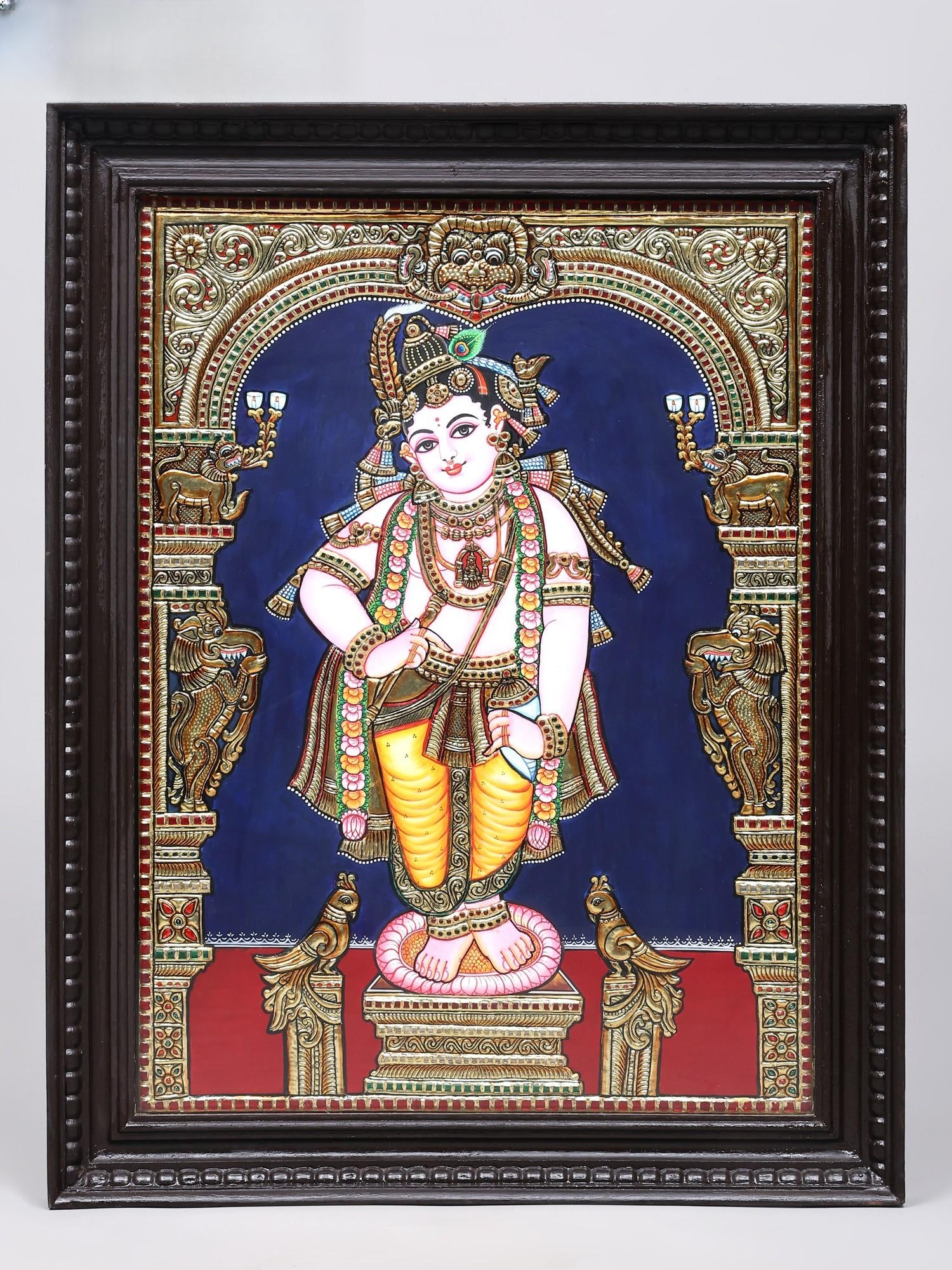 Standing Lord Krishna | 24 Karat Gold Work | Framed Tanjore Painting: Title: Standing Lord Krishna | 24 Karat Gold Work | Framed Tanjore Painting Description: Tanjore (Thanjavur) Painting Reserve: $760.00 Shipping: Domestic: Shipping rates are determined by de