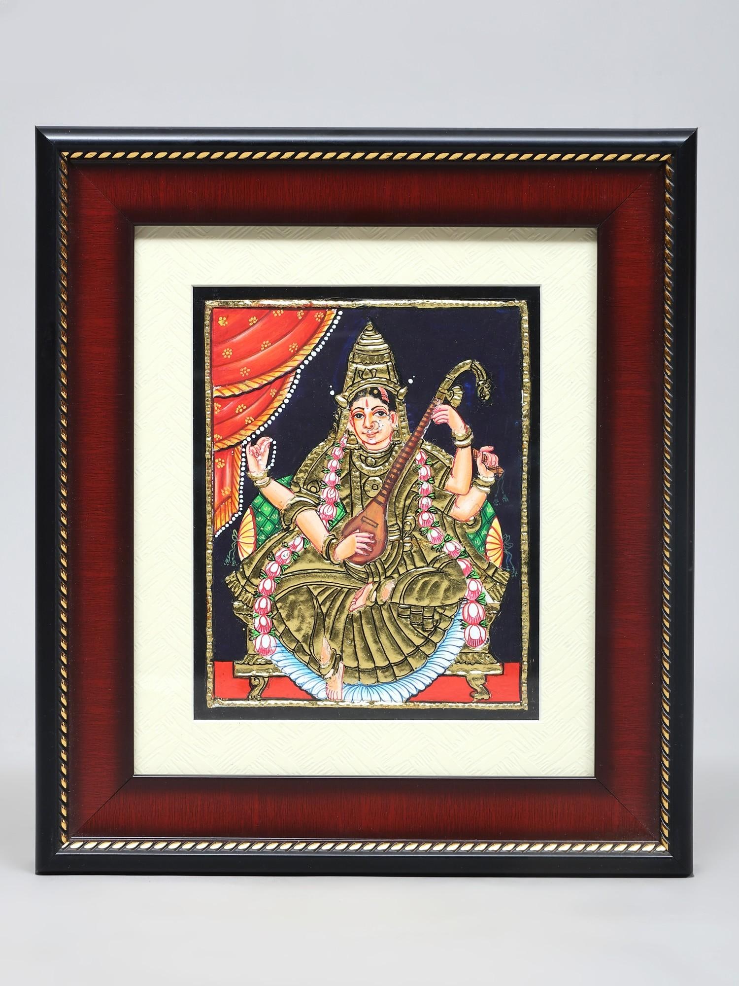 Seated Goddess Saraswati and Playing The Veena | Traditional Colors with 24 Karat Gold | Tanjore: Title: Seated Goddess Saraswati and Playing The Veena | Traditional Colors with 24 Karat Gold | Tanjore Painting with Frame Description: Tanjore (Thanjavur) Painting Reserve: $119.00 Shipping: