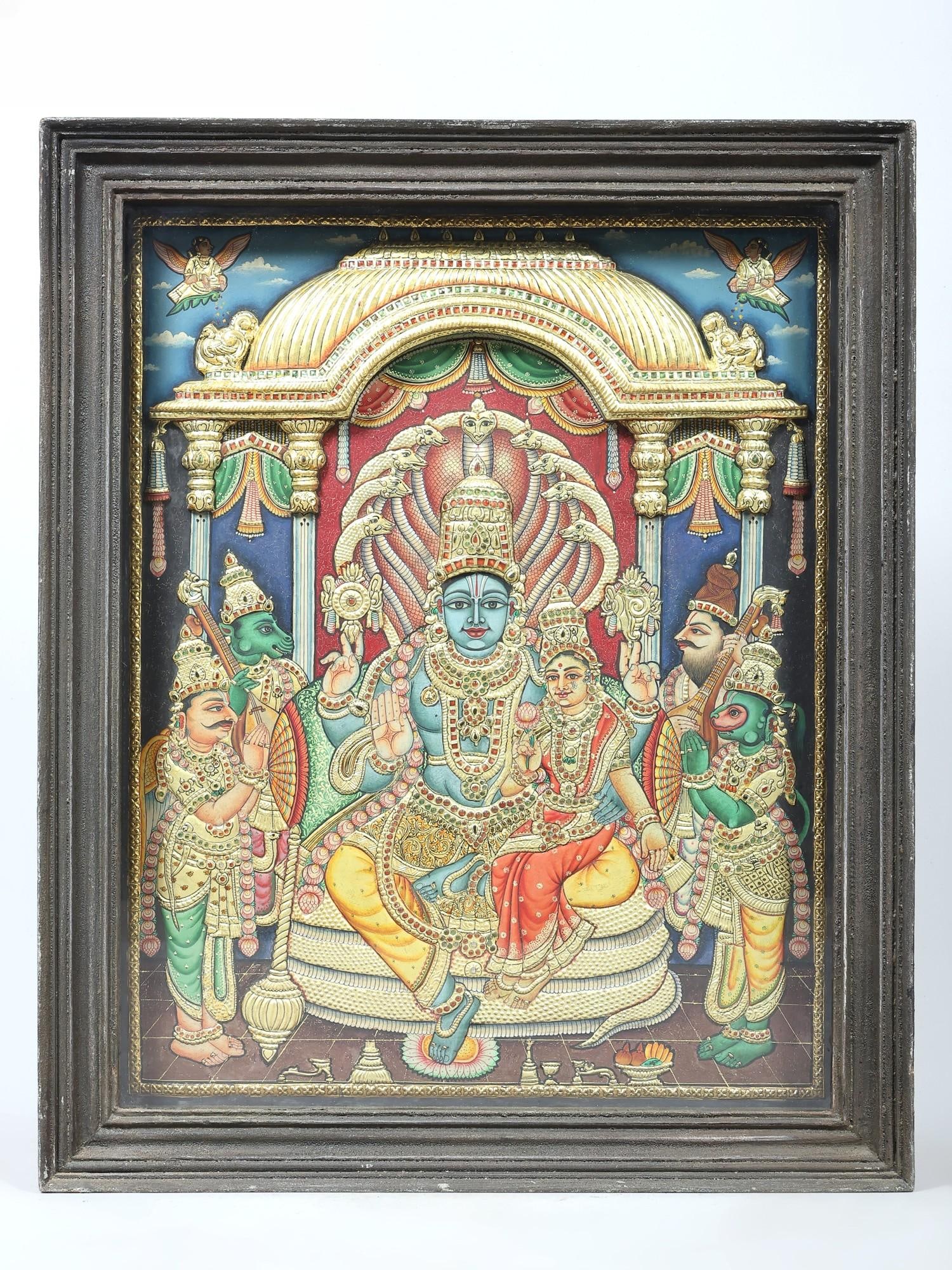 Vishnu-Lakshmi Seated on Sheshnag with Garuda and Hanuman Standing Beside Them | Embossed Tanjore: Title: Vishnu-Lakshmi Seated on Sheshnag with Garuda and Hanuman Standing Beside Them | Embossed Tanjore Painting with 24 Karat Gold Work | With Vintage Frame Description: Tanjore (Thanjavur)