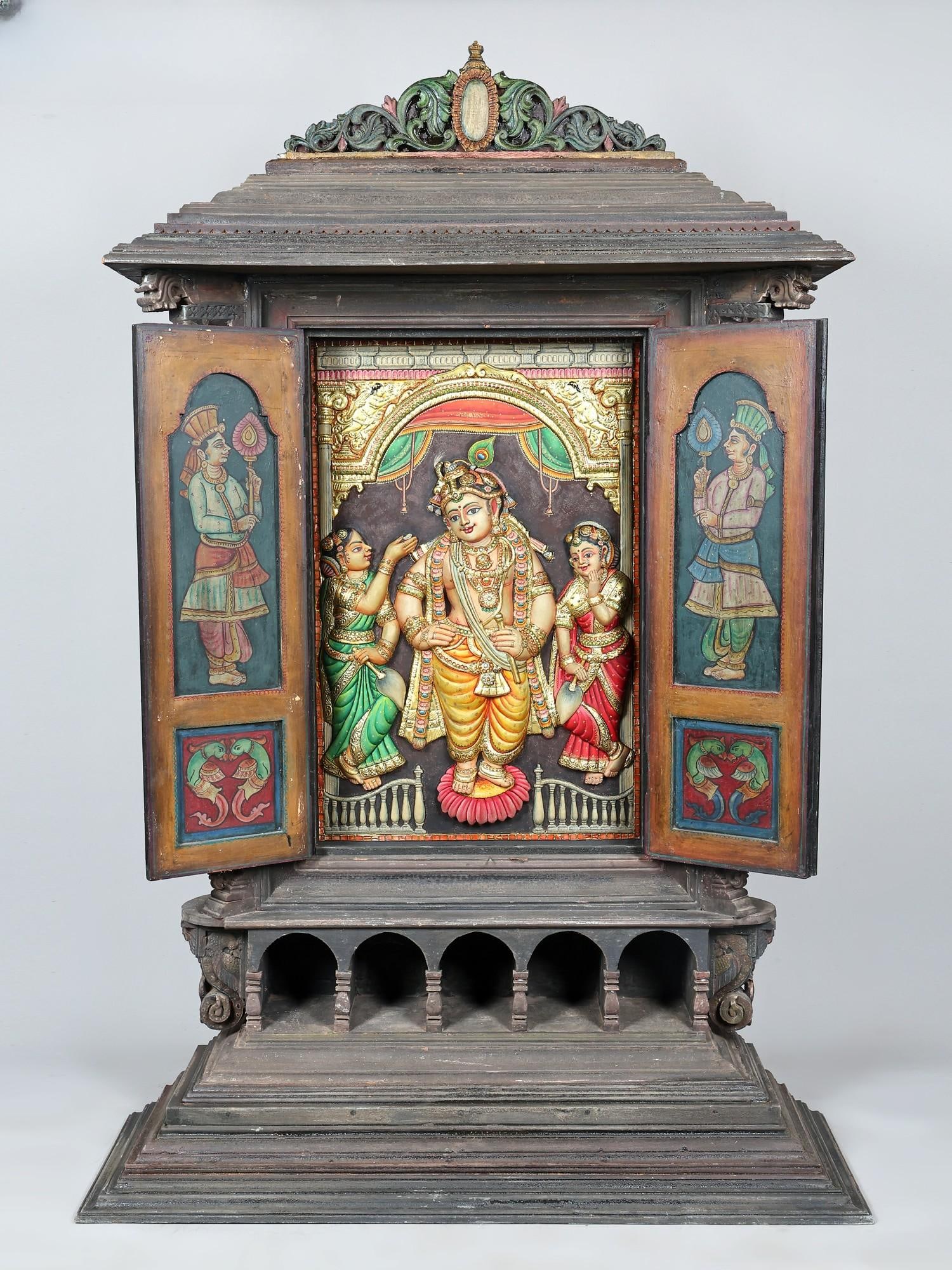 Huge Mandapam of Lord Krishna with Rukmini and Satyabhama | 24 Karat Gold Work | Embossed Three: Title: Huge Mandapam of Lord Krishna with Rukmini and Satyabhama | 24 Karat Gold Work | Embossed Three Dimensional Vintage Tanjore Painting Description: Tanjore (Thanjavur) Painting Reserve: